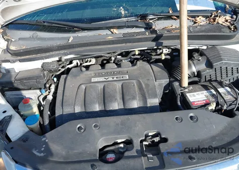 2010 Honda Odyssey Ex z USA, uszkodzony, nr VIN 5FNRL3H5XAB037897